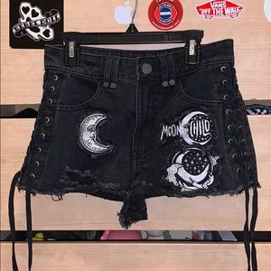 Black shorts with moons patches
